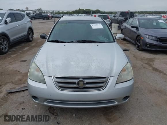 ✅ 2003 Nissan Altima S • VIN: 1N4AL11D03C185419 • Lot: 43535643. Listed on IAAI with 229,637 mi. Free auction sales archive from the USA and detailed vehicle history report at DreamBid. Image 12.