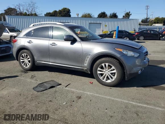 ✅ 2014 Infiniti QX70 • VIN: JN8CS1MW2EM413392 • Лот: 42974095. Опубликован ранее на Copart с пробегом 192 020 миль. Бесплатный доступ к архиву аукционных продаж из США и подробный отчёт об истории автомобиля на DreamBid. Изображение 4.