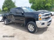 ✅ 2015 Chevrolet Silverado 2500HD LT • VIN: 1GC1KVEGXFF661574 • Lot: 42809342. Listed on IAAI with 265,001 mi. Free auction sales archive from the USA and detailed vehicle history report at DreamBid. Image 1.