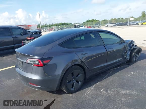 ✅ 2023 Tesla Model 3 • VIN: 5YJ3E1EA5PF577060 • Lot: 43115886. Listed on IAAI with 28,320 mi. Free auction sales archive from the USA and detailed vehicle history report at DreamBid. Image 4.
