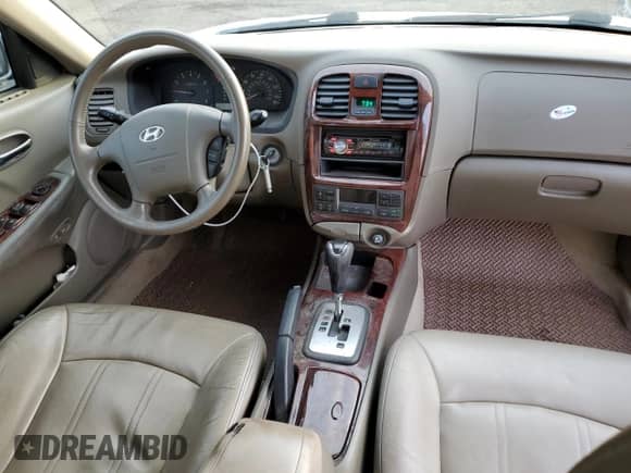 2004 Hyundai Sonata GLS z VIN KMHWF35H84A957433, wystawiony jako Copart lot #82852774 z przebiegiem 187 857 mil mil oraz Szkoda całkowita • Salvage title. Historia ofert i sprzedaży dostępna na DreamBid. Obrazek 8.