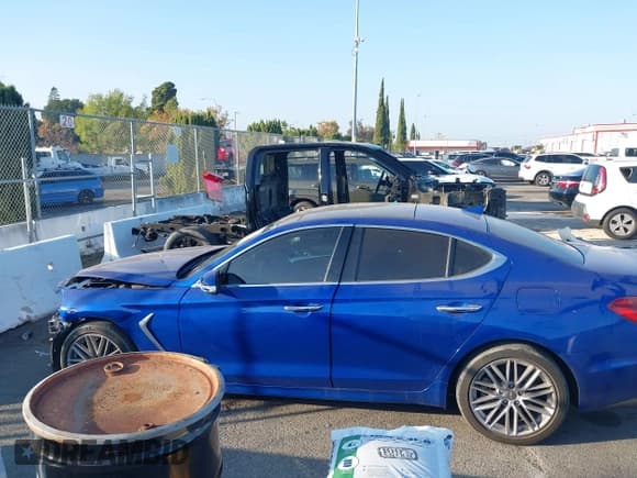 ✅ 2021 Genesis G70 2.0T • VIN: KMTG34LA4MU079688 • Lot: 43541034. Listed on IAAI with 55,723 mi. Free auction sales archive from the USA and detailed vehicle history report at DreamBid. Image 14.