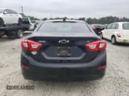 ✅ 2018 Chevrolet Cruze LT • VIN: 1G1BE5SM8J7242236 • Lot: 49886043. Listed on Copart with 65,872 mi. Free auction sales archive from the USA and detailed vehicle history report at DreamBid. Image 6.