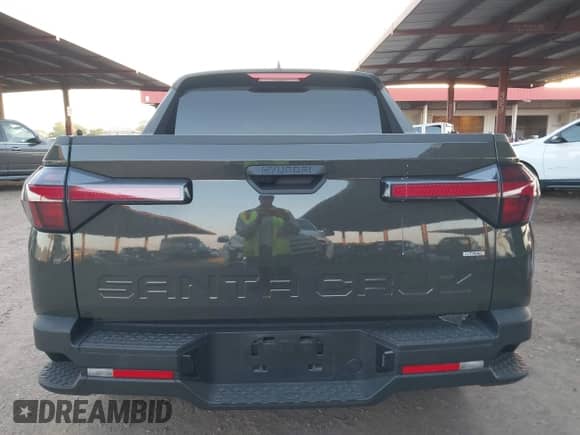 2025 Hyundai Santa Cruz SEL with VIN 5NTJBDDEXSH126921, listed as a IAAI auction lot 42632222 with 12,180 mi miles and . Bid and sale history available at DreamBid. Image 17.