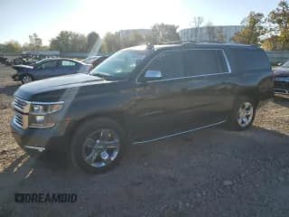 ✅ 2018 Chevrolet Suburban Premier • VIN: 1GNSKJKCXJR243819 • Lot: 85523015. Listed on Copart with 126,867 mi. Free auction sales archive from the USA and detailed vehicle history report at DreamBid. Image 1.