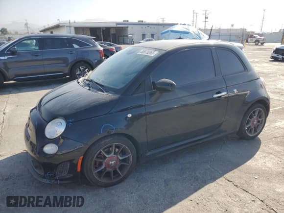 ✅ 2015 FIAT 500 Abarth • VIN: 3C3CFFFH3FT733252 • Lot: 80878265. Listed on Copart with 79,233 mi. Free auction sales archive from the USA and detailed vehicle history report at DreamBid. Image 1.