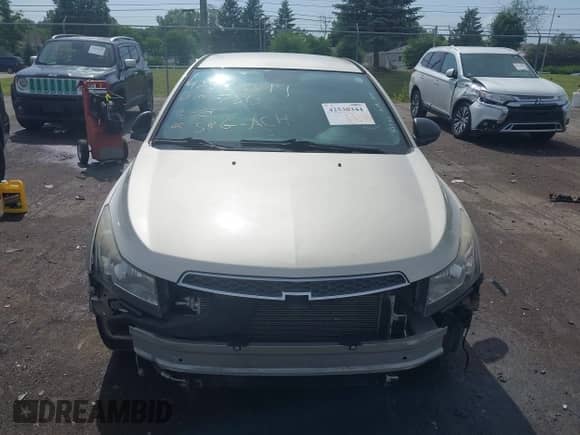 2013 Chevrolet Cruze LS with VIN 1G1PA5SH8D7327313, listed as a IAAI auction lot 42530344 with 147,158 mi miles and . Bid and sale history available at DreamBid. Image 12.