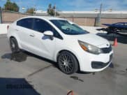 ✅ 2013 Kia Rio LX • VIN: KNADM4A31D6302306 • Lot: 43652171. Listed on IAAI with 141,467 mi. Free auction sales archive from the USA and detailed vehicle history report at DreamBid. Image 1.