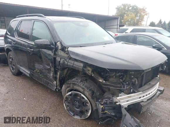 ✅ 2025 Honda Pilot TrailSport • VIN: 5FNYG1H63SB005131 • Lot: 43516849. Listed on IAAI with 26,789 mi. Free auction sales archive from the USA and detailed vehicle history report at DreamBid. Image 1.