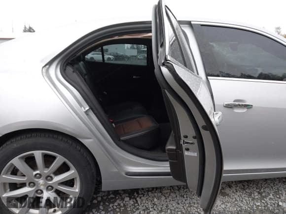 ✅ 2015 Chevrolet Malibu LTZ • VIN: 1G11F5SL3FF282110 • Lot: 43516279. Listed on IAAI with 131,961 mi. Free auction sales archive from the USA and detailed vehicle history report at DreamBid. Image 8.