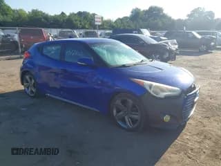 ✅ 2013 Hyundai Veloster Turbo • VIN: KMHTC6AE3DU146100 • Lot: 43121020. Listed on IAAI with 195,274 mi. Free auction sales archive from the USA and detailed vehicle history report at DreamBid. Image 1.