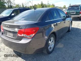 ✅ 2014 Chevrolet Cruze 1LT • VIN: 1G1PC5SB1E7218750 • Lot: 43329530. Listed on IAAI with 151,833 mi. Free auction sales archive from the USA and detailed vehicle history report at DreamBid. Image 4.