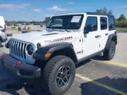 ✅ 2024 Jeep Wrangler Rubicon • VIN: 1C4PJXFG9RW336006 • Лот: 43709104. Опубликован ранее на IAAI с пробегом 24 665 миль. Бесплатный доступ к архиву аукционных продаж из США и подробный отчёт об истории автомобиля на DreamBid. Изображение 2.