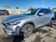 ✅ 2020 Mazda CX-5 Touring • VIN: JM3KFBCM8L1810080 • Lot: 90259945. Wystawiony na Copart z przebiegiem 57 139 mil. Bezpłatny archiwum sprzedaży aukcyjnych z USA i szczegółowy raport historii pojazdu na DreamBid. Zdjęcie 1.