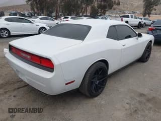 ✅ 2014 Dodge Challenger SXT • VIN: 2C3CDYAG6EH289999 • Lot: 41500473. Wystawiony na IAAI z przebiegiem 165 161 mil. Bezpłatny archiwum sprzedaży aukcyjnych z USA i szczegółowy raport historii pojazdu na DreamBid. Zdjęcie 4.
