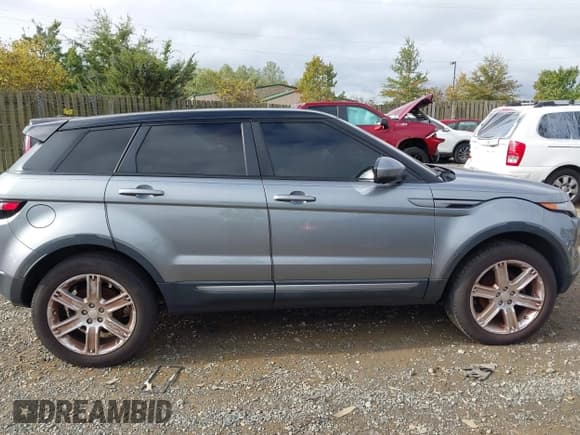 ✅ 2015 Land Rover Range Rover Evoque Pure Premium • VIN: SALVR2BG0FH973464 • Lot: 43441088. Wystawiony na IAAI z przebiegiem 122 550 mil. Bezpłatny archiwum sprzedaży aukcyjnych z USA i szczegółowy raport historii pojazdu na DreamBid. Zdjęcie 13.