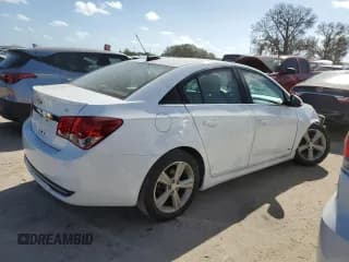 ✅ 2015 Chevrolet Cruze LT • VIN: 1G1PE5SBXF7103849 • Lot: 40605673. Listed on Copart with 96,616 mi. Free auction sales archive from the USA and detailed vehicle history report at DreamBid. Image 3.