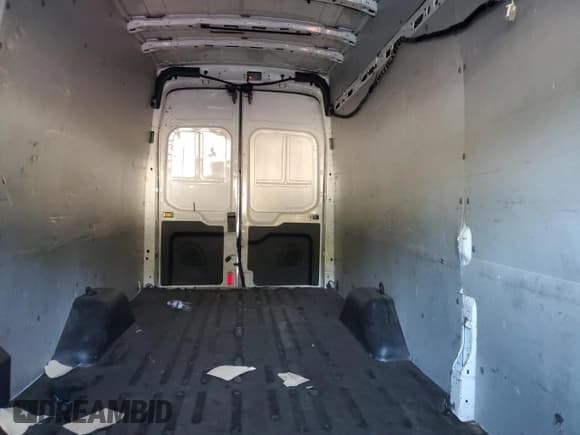 ✅ 2019 Ford Transit • VIN: 1FTBW3XM2KKB81756 • Лот: 71036005. Опубликован ранее на Copart с пробегом 163 598 миль. Бесплатный доступ к архиву аукционных продаж из США и подробный отчёт об истории автомобиля на DreamBid. Изображение 10.