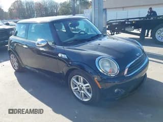 ✅ 2011 MINI Hardtop • VIN: WMWSU3C5XBT092030 • Lot: 43914344. Listed on IAAI with 107,245 mi. Free auction sales archive from the USA and detailed vehicle history report at DreamBid. Image 1.