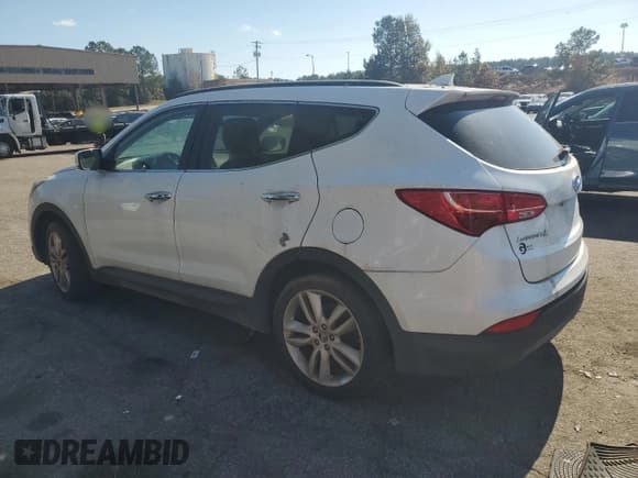 ✅ 2014 Hyundai Santa Fe • VIN: 5XYZUDLA5EG213633 • Лот: 91793175. Опубликован ранее на Copart с пробегом 206 521 миль. Бесплатный доступ к архиву аукционных продаж из США и подробный отчёт об истории автомобиля на DreamBid. Изображение 2.