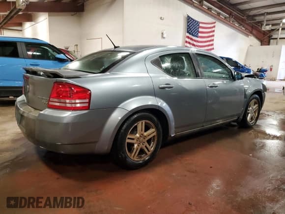 ✅ 2010 Dodge Avenger R/T • VIN: 1B3CC5FB0AN216236 • Лот: 77963664. Опубликован ранее на Copart с пробегом 198 982 миль. Бесплатный доступ к архиву аукционных продаж из США и подробный отчёт об истории автомобиля на DreamBid. Изображение 3.