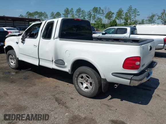 ✅ 1999 Ford F-150 • VIN: 2FTRX08W0XCA56180 • Lot: 42865592. Listed on IAAI with 203,986 mi. Free auction sales archive from the USA and detailed vehicle history report at DreamBid. Image 3.
