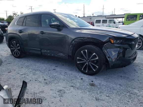 ✅ 2023 Mazda CX-50 S Premium Plus • VIN: 7MMVABEM8PN136223 • Lot: 71307085. Listed on Copart with 22,401 mi. Free auction sales archive from the USA and detailed vehicle history report at DreamBid. Image 4.