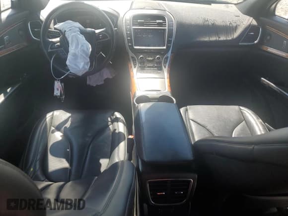 ✅ 2019 Lincoln Nautilus Reserve • VIN: 2LMPJ6LP1KBL50990 • Lot: 69210645. Listed on Copart with 65,309 mi. Free auction sales archive from the USA and detailed vehicle history report at DreamBid. Image 8.