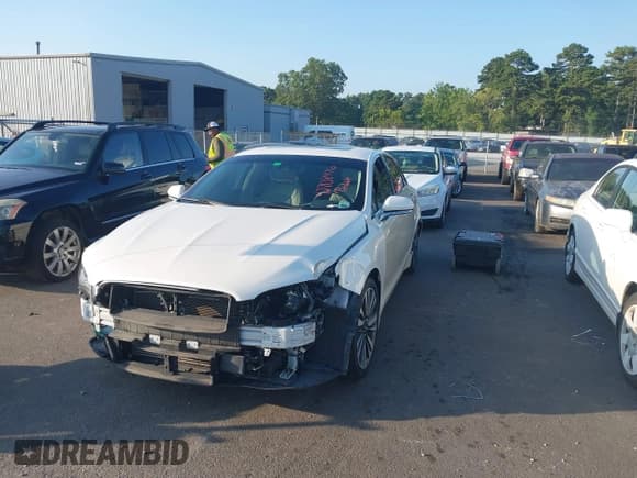 ✅ 2018 Lincoln MKZ Reserve • VIN: 3LN6L5E96JR610584 • Lot: 42708476. Listed on IAAI with 58,747 mi. Free auction sales archive from the USA and detailed vehicle history report at DreamBid. Image 19.