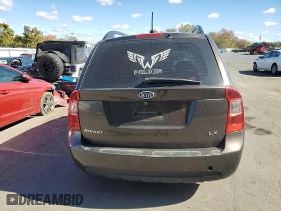 ✅ 2009 Kia Rondo LX • VIN: KNAFG528497260778 • Lot: 76497534. Listed on Copart with 276,585 mi. Free auction sales archive from the USA and detailed vehicle history report at DreamBid. Image 6.