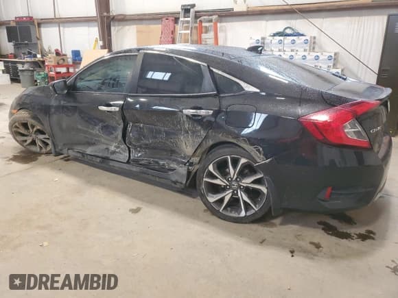 ✅ 2020 Honda Civic Touring • VIN: 2HGFC1F92LH101846 • Лот: 92836695. Опубликован ранее на Copart с пробегом 151 146 миль. Бесплатный доступ к архиву аукционных продаж из США и подробный отчёт об истории автомобиля на DreamBid. Изображение 2.