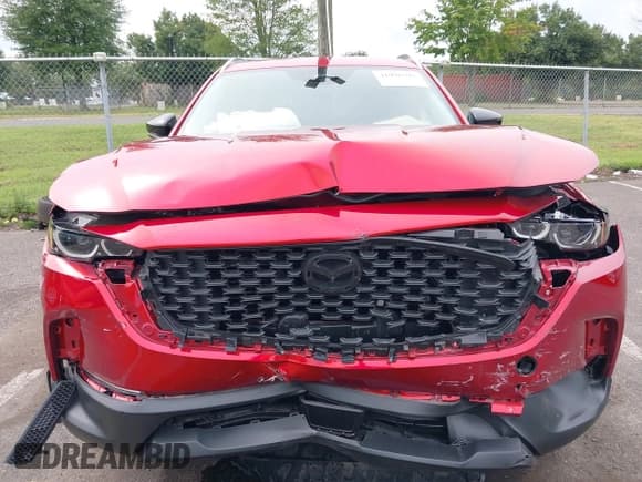 ✅ 2025 Mazda CX-50 S Preferred • VIN: 7MMVABBM8SN316105 • Lot: 42996595. Listed on IAAI with 3,677 mi. Free auction sales archive from the USA and detailed vehicle history report at DreamBid. Image 6.