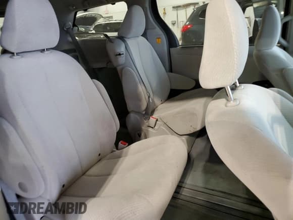 ✅ 2013 Toyota Sienna LE • VIN: 5TDKK3DC8DS282464 • Lot: 90034475. Listed on Copart with 122,791 mi. Free auction sales archive from the USA and detailed vehicle history report at DreamBid. Image 11.