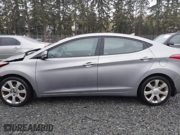 ✅ 2012 Hyundai Elantra Limited • VIN: KMHDH4AEXCU191821 • Lot: 43517212. Listed on IAAI with 154,900 mi. Free auction sales archive from the USA and detailed vehicle history report at DreamBid. Image 14.