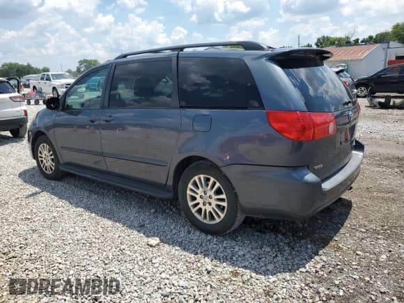 2009 Toyota Sienna LE with VIN 5TDBK23C59S026009, listed as a Copart auction lot 64553505 with 187,214 mi miles and Salvage title. Bid and sale history available at DreamBid. Image 2.