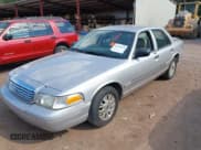 ✅ 2004 Ford Crown Victoria LX • VIN: 2FAFP74W14X168353 • Лот: 43179419. Опубликован ранее на IAAI с пробегом Не указан. Бесплатный доступ к архиву аукционных продаж из США и подробный отчёт об истории автомобиля на DreamBid. Изображение 2.