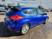 ✅ 2015 Ford Focus Titanium • VIN: 1FADP3N24FL200272 • Lot: 84259275. Wystawiony na Copart z przebiegiem 115 506 mil. Bezpłatny archiwum sprzedaży aukcyjnych z USA i szczegółowy raport historii pojazdu na DreamBid. Zdjęcie 3.
