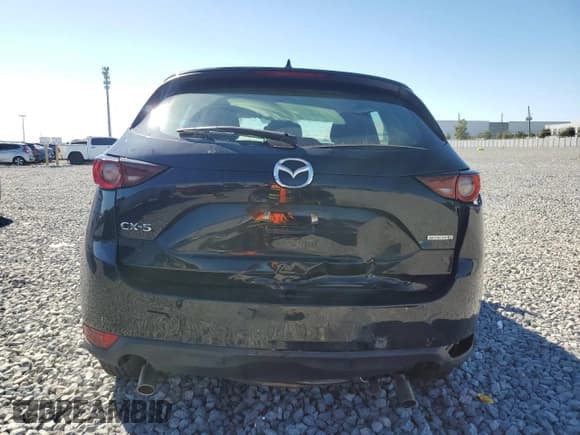 ✅ 2021 Mazda CX-5 Sport • VIN: JM3KFABM1M0349159 • Lot: 90879165. Wystawiony na Copart z przebiegiem 71 545 mil. Bezpłatny archiwum sprzedaży aukcyjnych z USA i szczegółowy raport historii pojazdu na DreamBid. Zdjęcie 6.