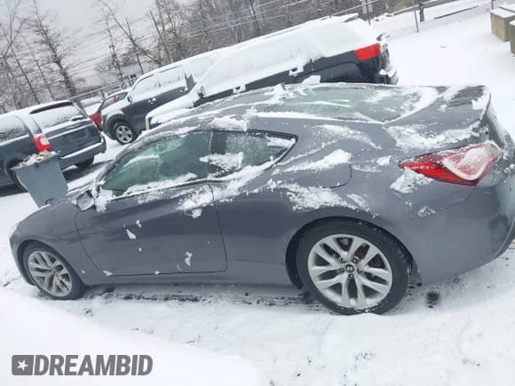 2014 Hyundai Genesis Coupe R-Spec with VIN KMHHT6KD8EU114093, listed as a IAAI auction lot 41261121 with 51,172 mi miles and . Bid and sale history available at DreamBid. Image 13.