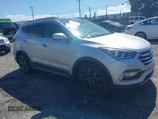 ✅ 2018 Hyundai Santa Fe Ultimate • VIN: 5XYZWDLA1JG534489 • Lot: 42289672. Listed on IAAI with 93,198 mi. Free auction sales archive from the USA and detailed vehicle history report at DreamBid. Image 1.