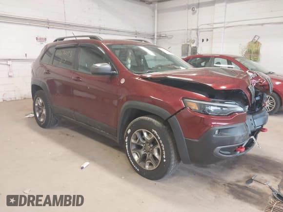 ✅ 2019 Jeep Cherokee Trailhawk • VIN: 1C4PJMBX0KD361981 • Лот: 42074093. Опубликован ранее на IAAI с пробегом 56 989 миль. Бесплатный доступ к архиву аукционных продаж из США и подробный отчёт об истории автомобиля на DreamBid. Изображение 1.