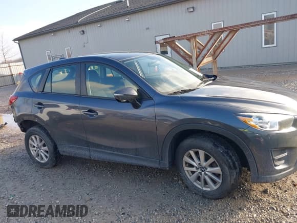 ✅ 2016 Mazda CX-5 Sport • VIN: JM3KE4BY9G0784667 • Lot: 43737851. Listed on IAAI with 151,569 mi. Free auction sales archive from the USA and detailed vehicle history report at DreamBid. Image 13.