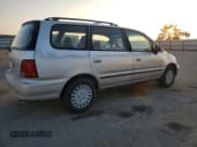 ✅ 1997 Honda Odyssey • VIN: JHMRA1842VC003732 • Lot: 86205204. Listed on Copart with 136,693 mi. Free auction sales archive from the USA and detailed vehicle history report at DreamBid. Image 3.