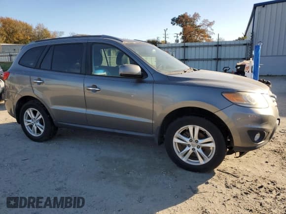 ✅ 2012 Hyundai Santa Fe Limited • VIN: 5XYZK3AB9CG142851 • Lot: 92812755. Listed on Copart with 224,572 mi. Free auction sales archive from the USA and detailed vehicle history report at DreamBid. Image 4.