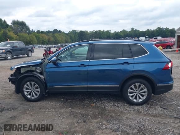 ✅ 2018 Volkswagen Tiguan SEL • VIN: 3VV3B7AX0JM187672 • Лот: 43338554. Опубликован ранее на IAAI с пробегом 184 529 миль. Бесплатный доступ к архиву аукционных продаж из США и подробный отчёт об истории автомобиля на DreamBid. Изображение 15.