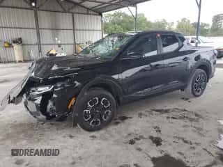 2024 Hyundai Santa Cruz SEL z VIN 5NTJC4DE9RH112614, wystawiony jako Copart lot #71353384 z przebiegiem 1 938 mil mil oraz Szkoda całkowita • Salvage title. Historia ofert i sprzedaży dostępna na DreamBid. Obrazek 1.