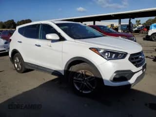 ✅ 2018 Hyundai Santa Fe 2.4L • VIN: 5NMZT3LB3JH070610 • Лот: 40257714. Опубликован ранее на Copart с пробегом 130 044 миль. Бесплатный доступ к архиву аукционных продаж из США и подробный отчёт об истории автомобиля на DreamBid. Изображение 4.