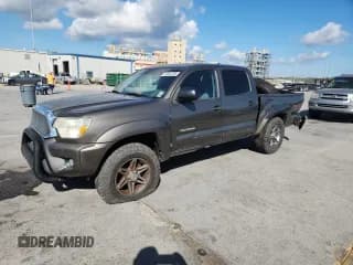 ✅ 2012 Toyota Tacoma PreRunner • VIN: 5TFJU4GN8CX027217 • Lot: 93393785. Listed on Copart with 157,414 mi. Free auction sales archive from the USA and detailed vehicle history report at DreamBid. Image 1.