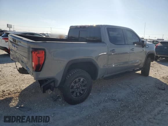 ✅ 2024 GMC Sierra 1500 AT4X • VIN: 3GTUUFE89RG304606 • Лот: 45781095. Опубликован ранее на Copart с пробегом 27 140 миль. Бесплатный доступ к архиву аукционных продаж из США и подробный отчёт об истории автомобиля на DreamBid. Изображение 3.