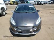 ✅ 2015 Ford Fiesta Titanium • VIN: 3FADP4CJ4FM110781 • Lot: 54141695. Wystawiony na Copart z przebiegiem 108 612 mil. Bezpłatny archiwum sprzedaży aukcyjnych z USA i szczegółowy raport historii pojazdu na DreamBid. Zdjęcie 5.